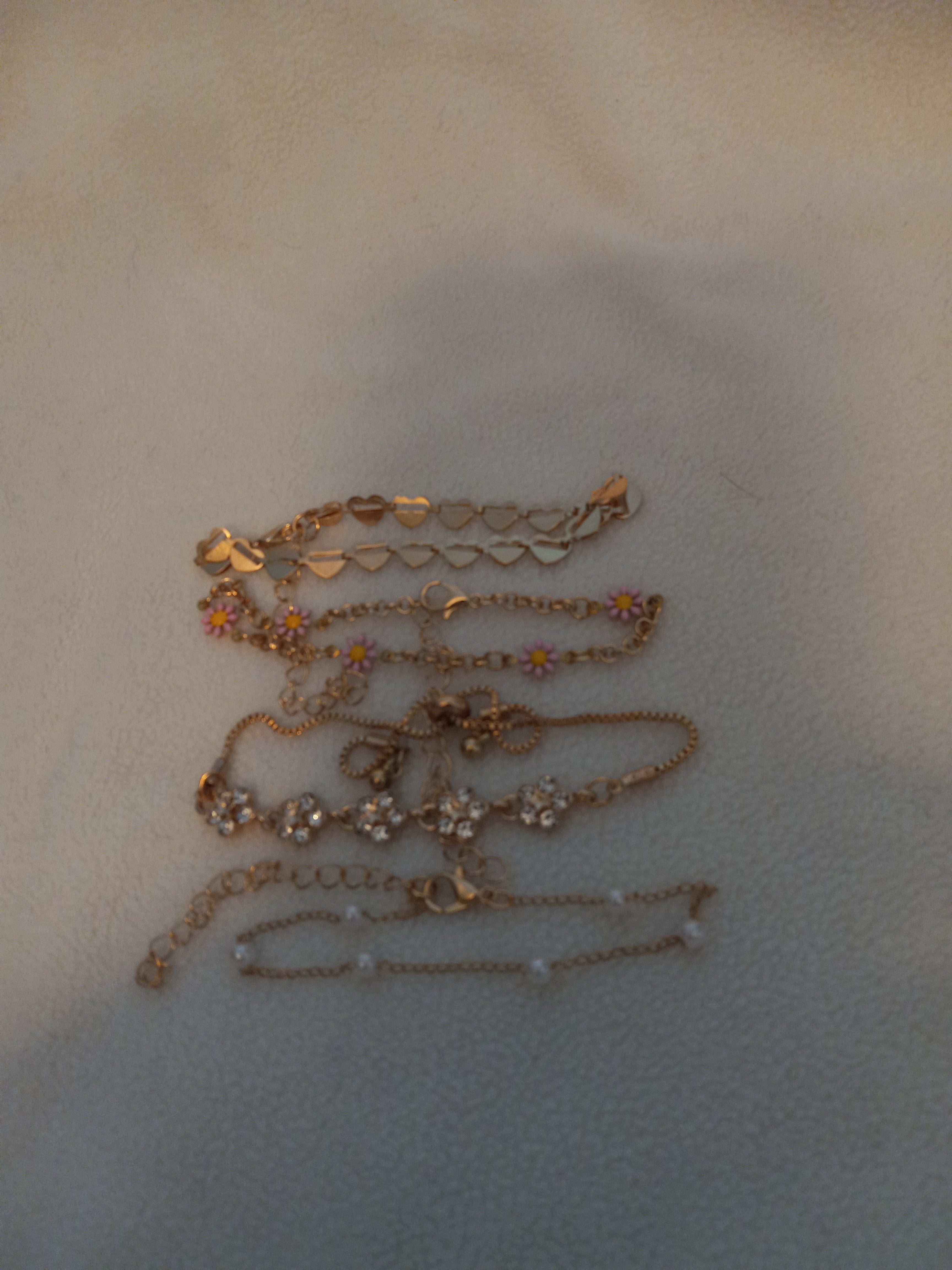J 33  Set of 4 Gold Bracelets