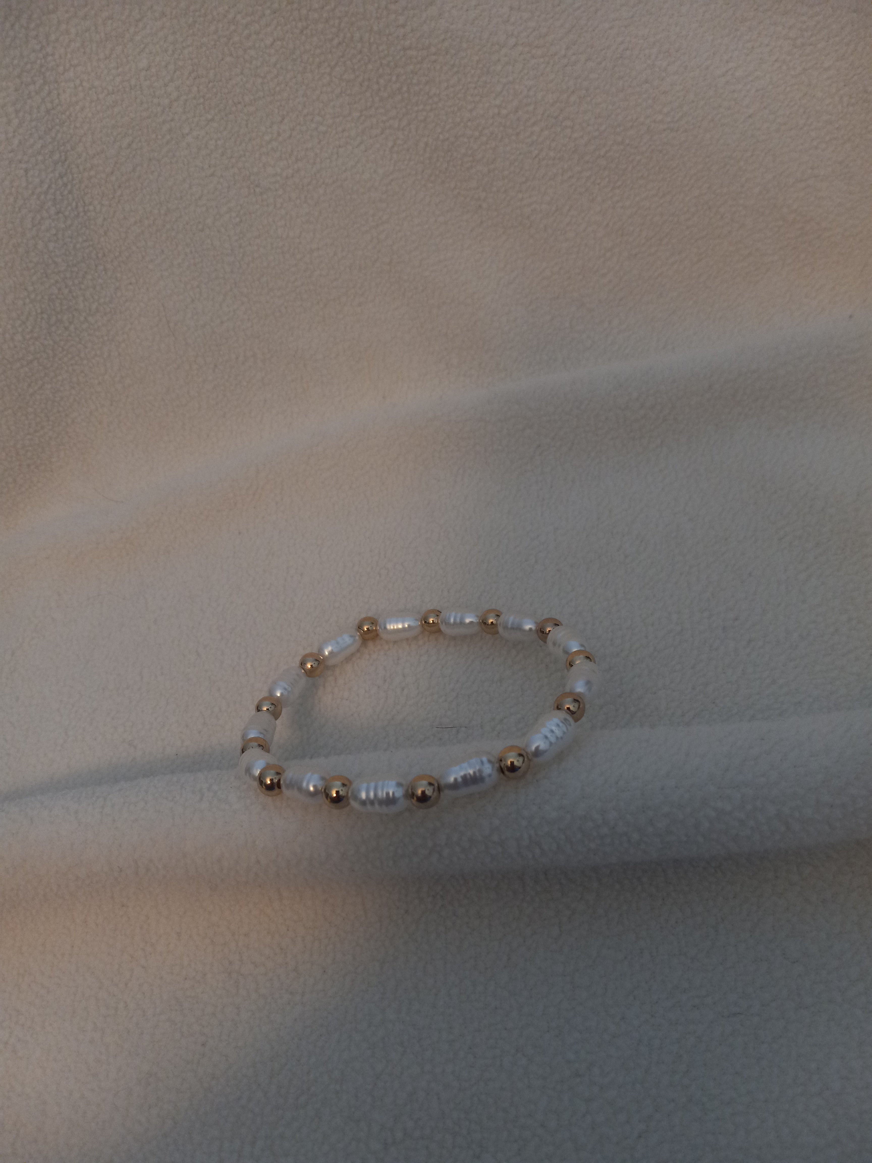 J 82  Gold and Faux Pearl Bracelet