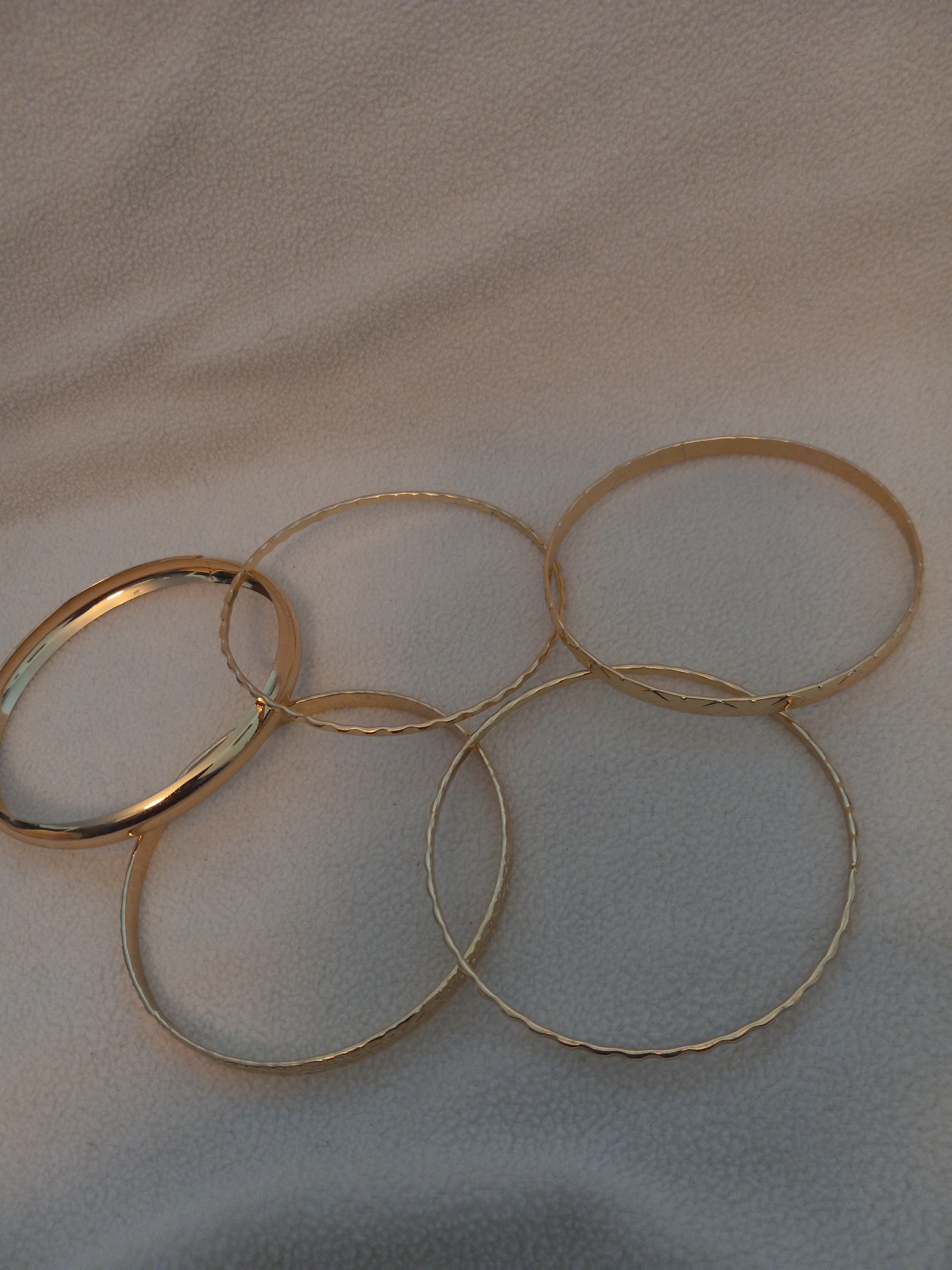 J 41  Set of 5 Gold Bangle Bracelets