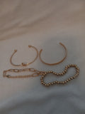 J 70  Set of 4 Gold Bracelets
