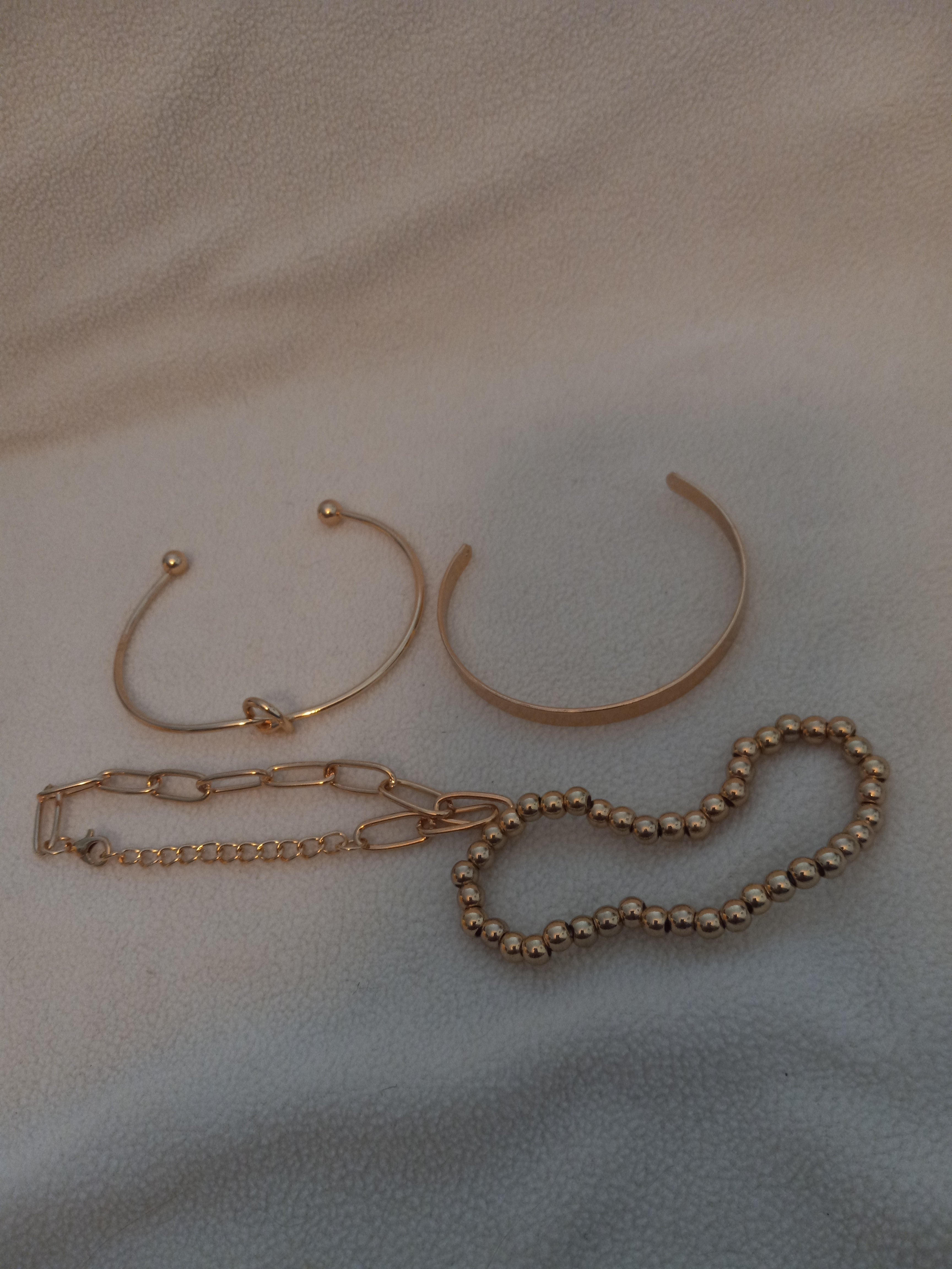 J 70  Set of 4 Gold Bracelets