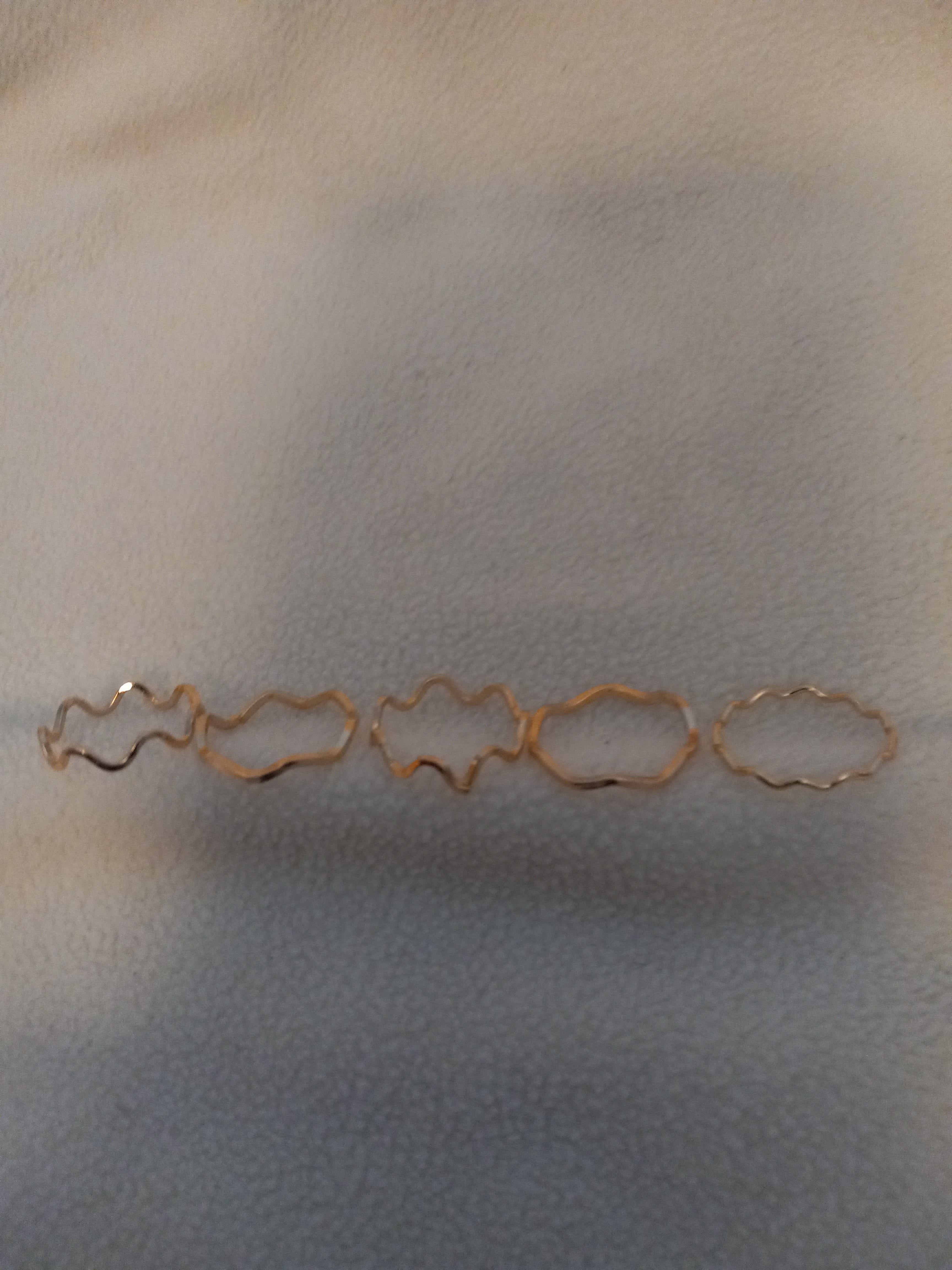 J 103  Set of 5 Wavy Gold Rings