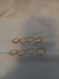 J 105  Set of 8 Gold Rings