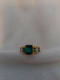 J 109  Gold Ladies Ring with Emerald Green  Stones - Size 7