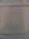L 11  Ecru 5 1/2 inch Hand Cut Plastic Doilies