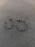 J 210  Silver Rope Look Earrings