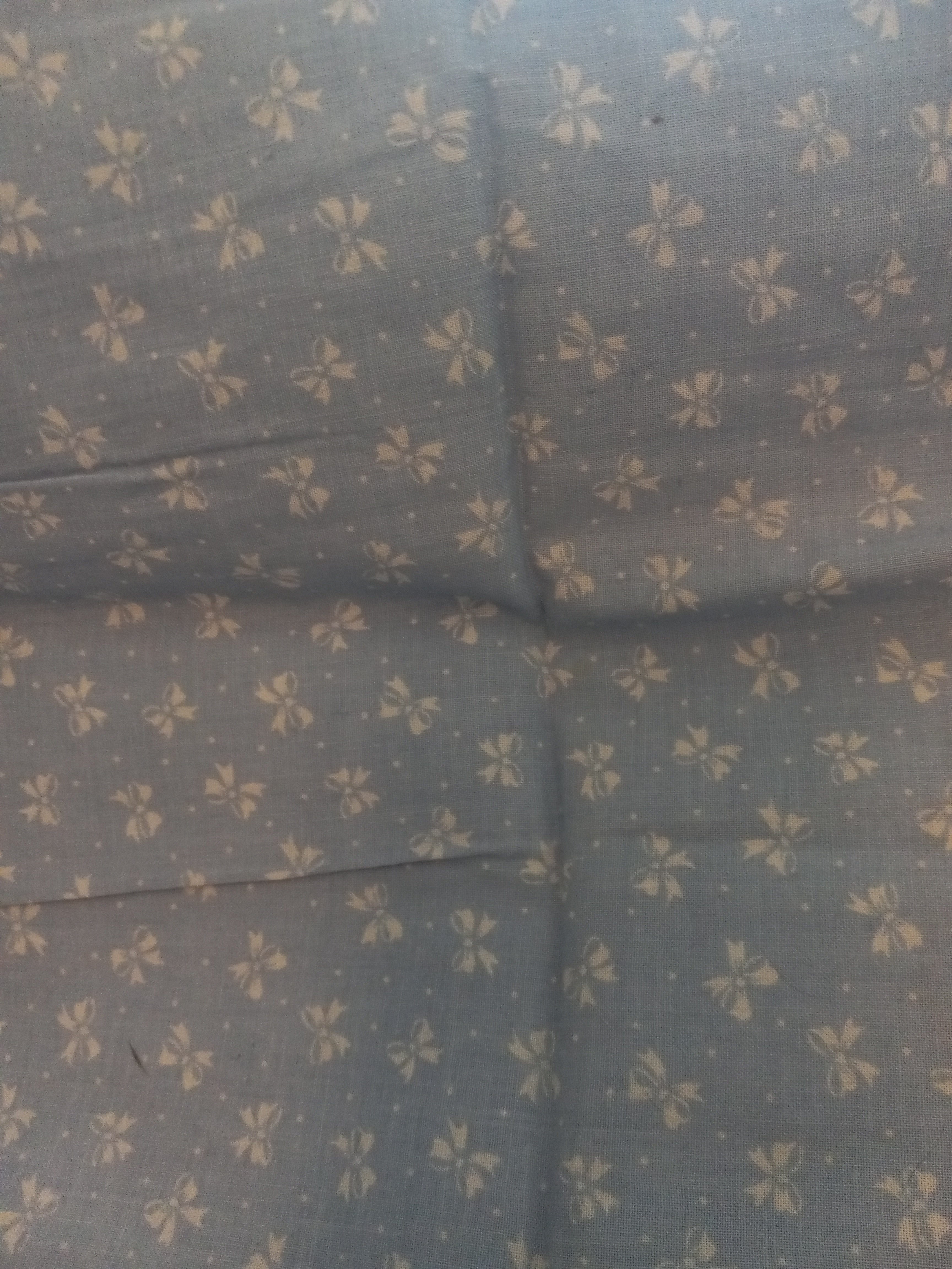 F220  Light Blue Cotton Blend Fabric with Tiny Bows