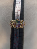 J 277  Gold Ring with Red, Blue, and Crystal Stones - Size 8