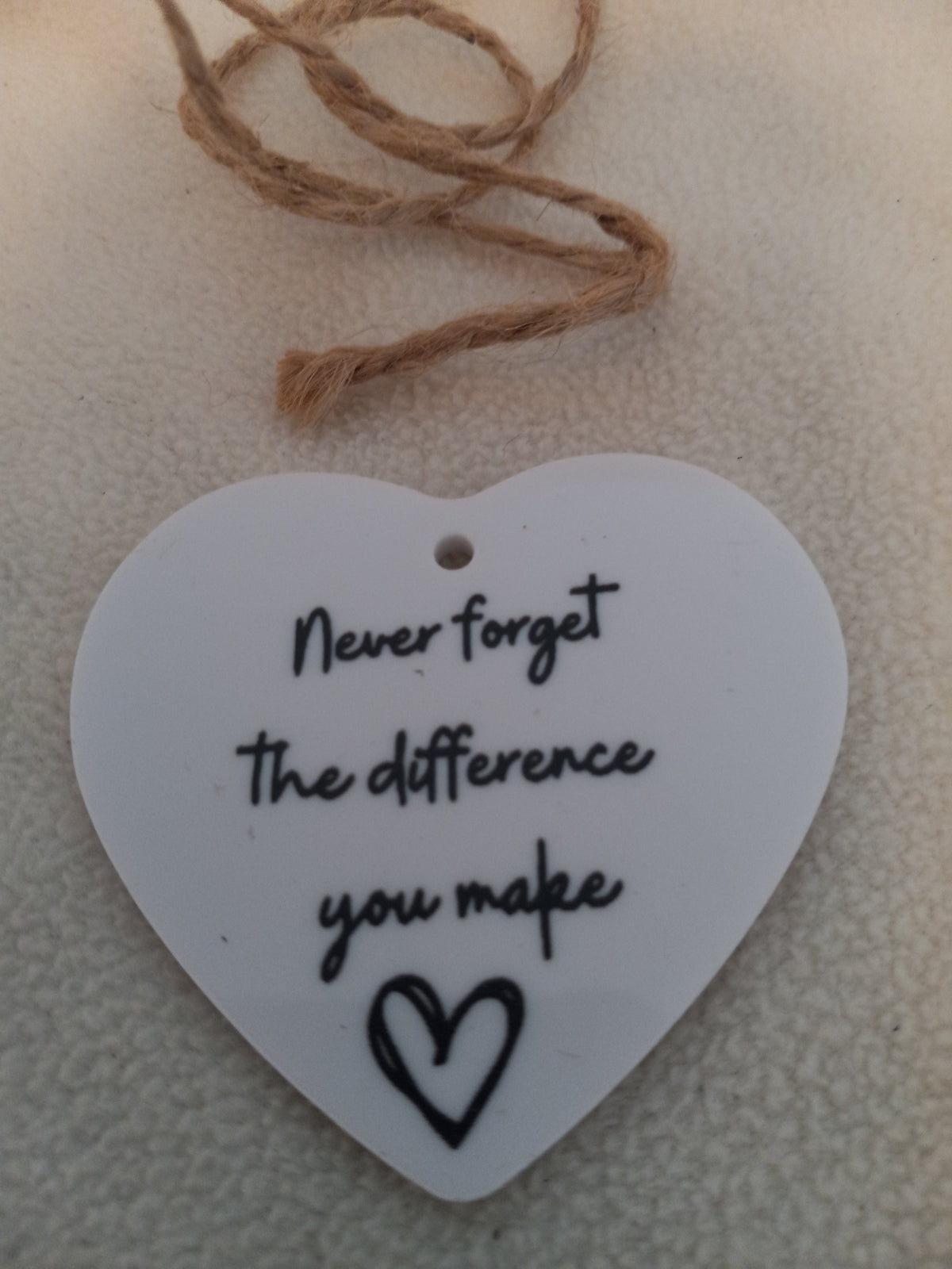 Heart Ornament with saying "Never Forget the Difference You Make"